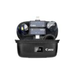 A black Caisi carrying case, featuring the Caisi logo and a digital display, is open to reveal the neatly organized Caisi Mic One – Lightweight Wireless Microphone for Smartphones transmitters, receivers, and accessories inside.